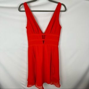 bebe | Vibrant Orange Mini Dress in Size 0 (excellent conditions)